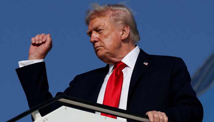 U.S. President Donald Trump gestures as he boards Air Force One en route to Sharm El-Sheikh, Egypt, to attend a summit of world leaders on ending the Gaza war, October 13, 2025.— Reuters