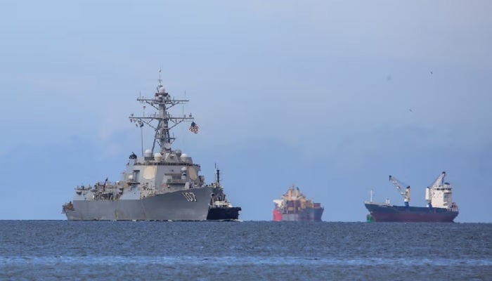 The U.S. Navy destroyer USS Gravely (DDG-107) approaches Port of Spain to conduct joint training with the Trinidad and Tobago Defense Forces to strengthen regional security and military cooperation, as seen from Port of Spain, Trinidad and Tobago, October 26, 2025. – Reuters