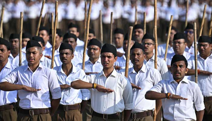 Rashtriya Swayamsevak Sangh (RSS) volunteers take part in the Hindu nationalist organization's centenary celebrations at Reshimbagh Ground in Nagpur on October 2, 2025. – AFP