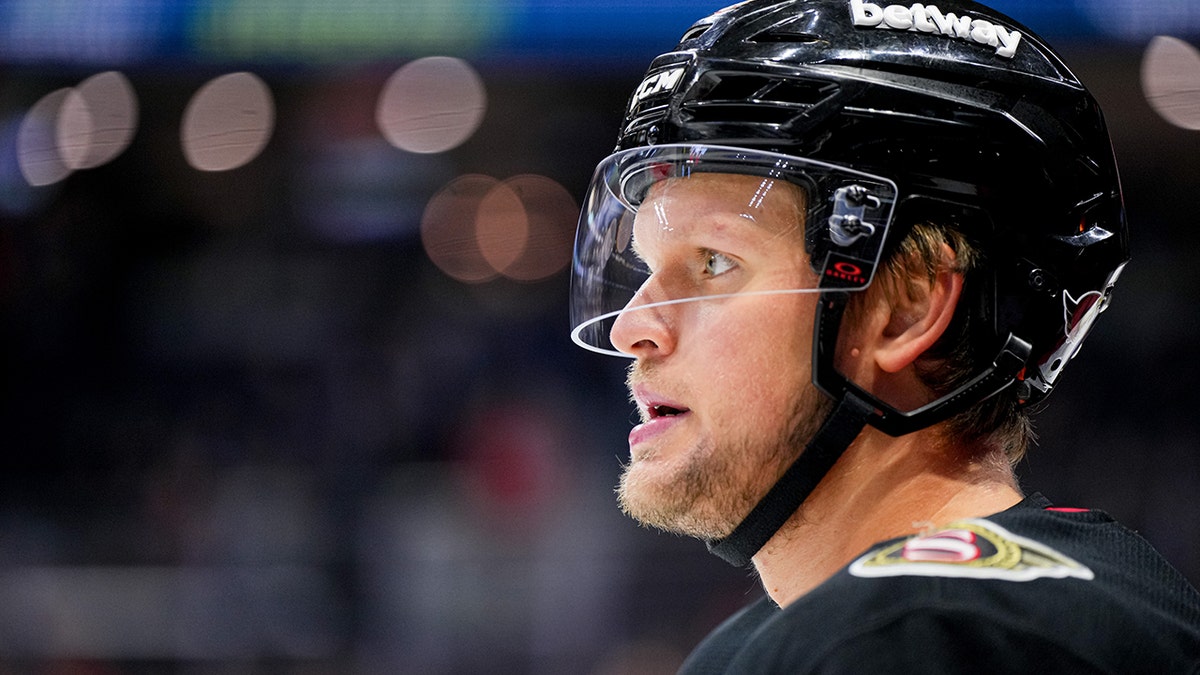 arthur kaliyev with hockey helmet during the game