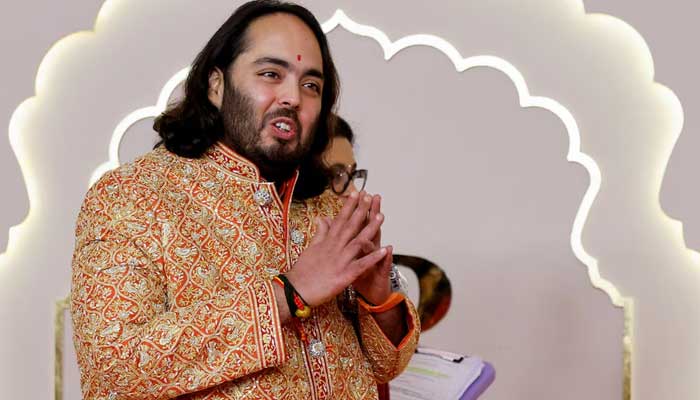 Anant Ambani, son of Mukesh Ambani, gestures during an event in Mumbai, India, on July 12, 2024 – Reuters