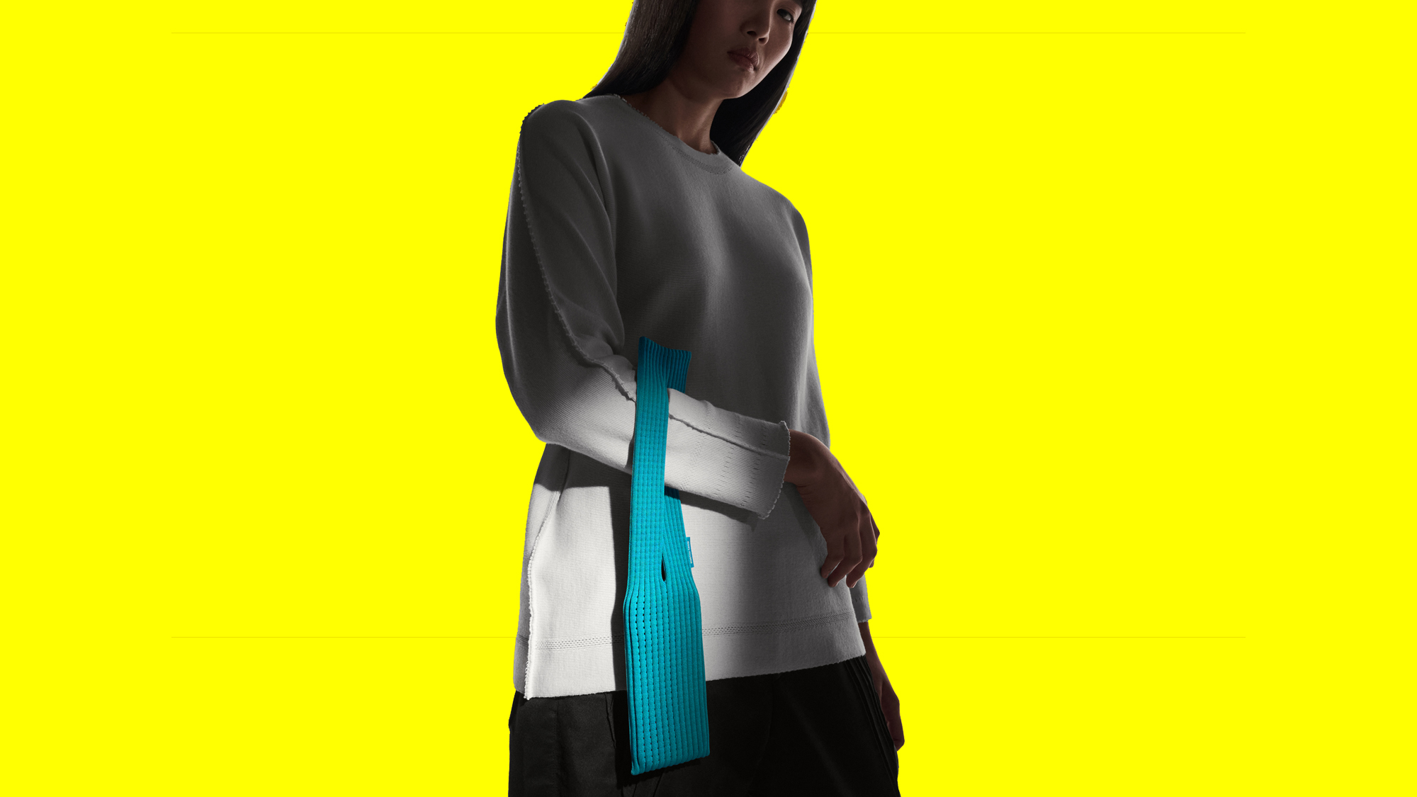 iPhone Pocket accessory on yellow background