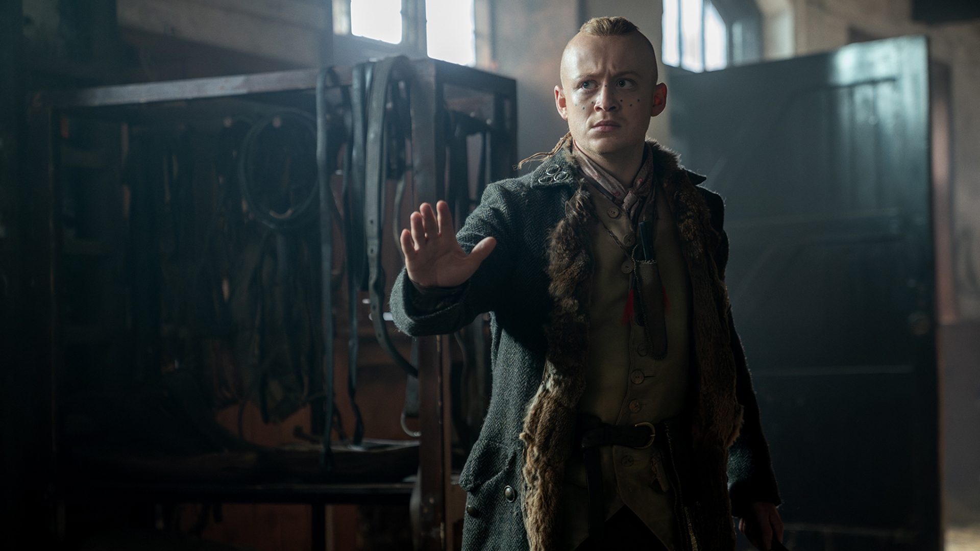 Young Ian extends his hand in Outlander season 7