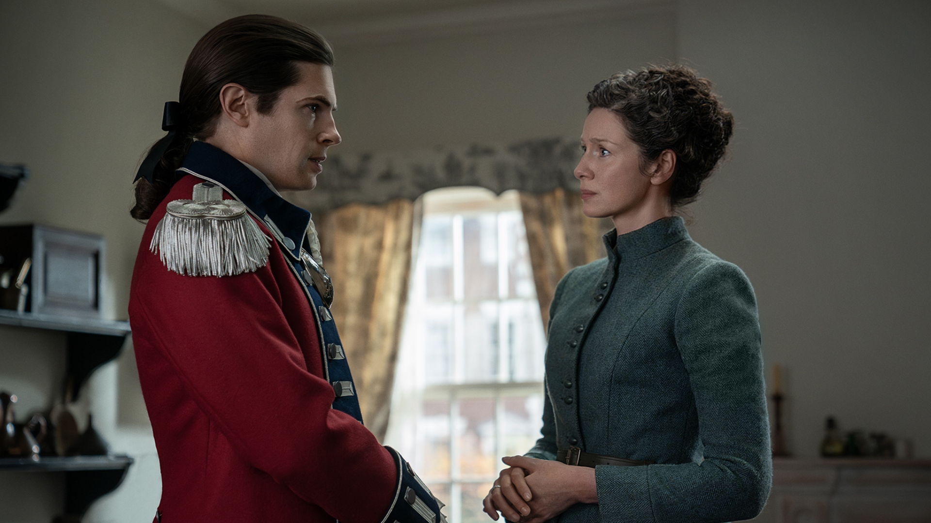 Claire looks at a soldier in Outlander season 7