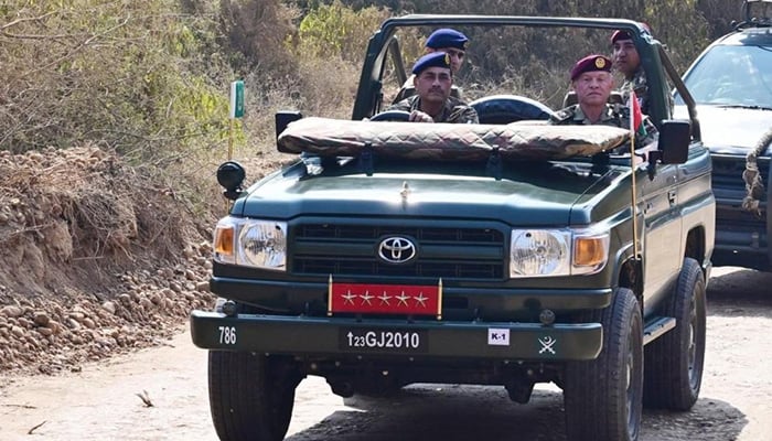 Field Marshal Asim Munir drives with Jordanian King Abdullah during his visit to the Tilla shooting ranges. — ISPR