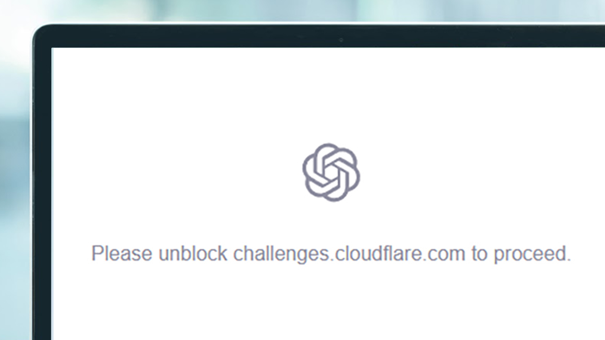 Laptop screen displays ChatGPT error message