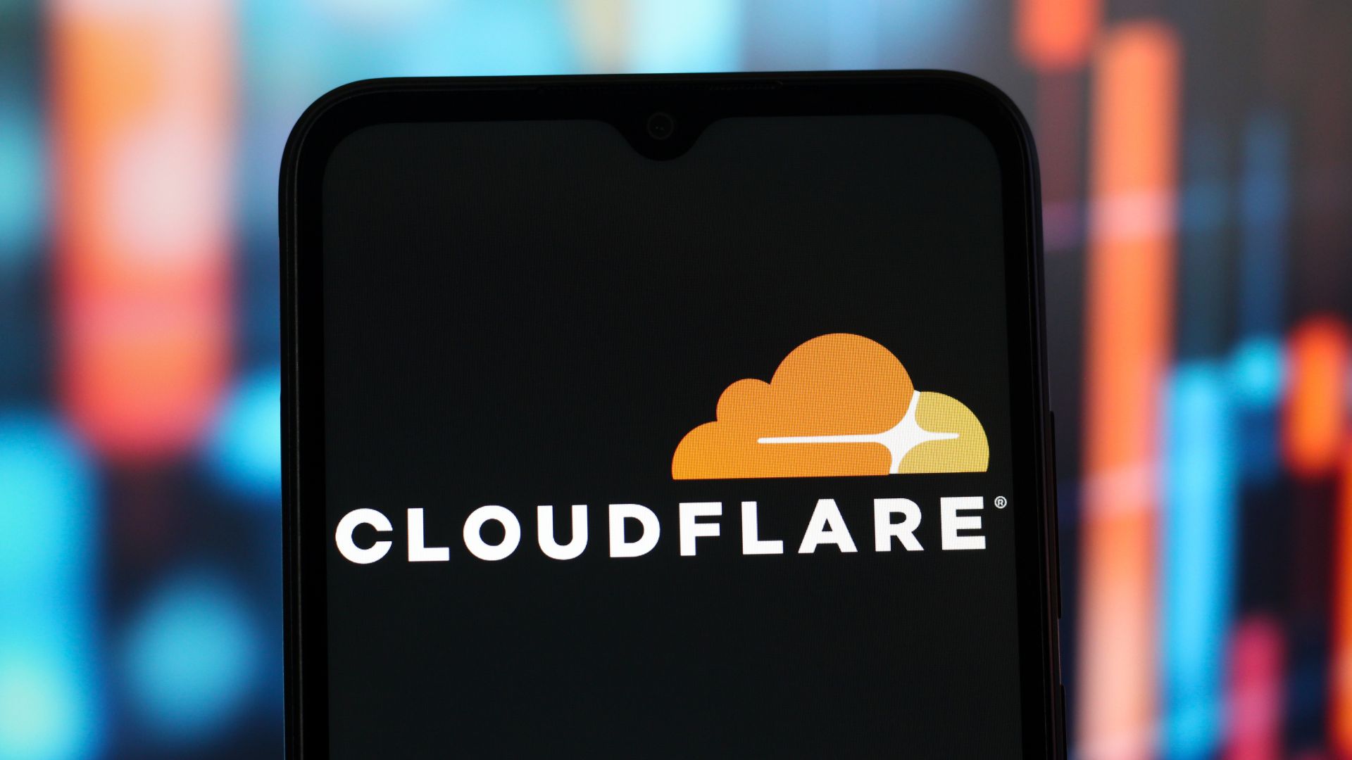 In this photo illustration, the Cloudflare logo is seen on the screen of a smartphone.