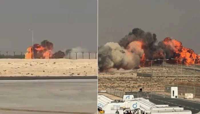 Smoke and flames rise after the Indian-built Tejas fighter jet crashed at the Dubai Airshow on November 21, 2025. — X/@IndianExpress