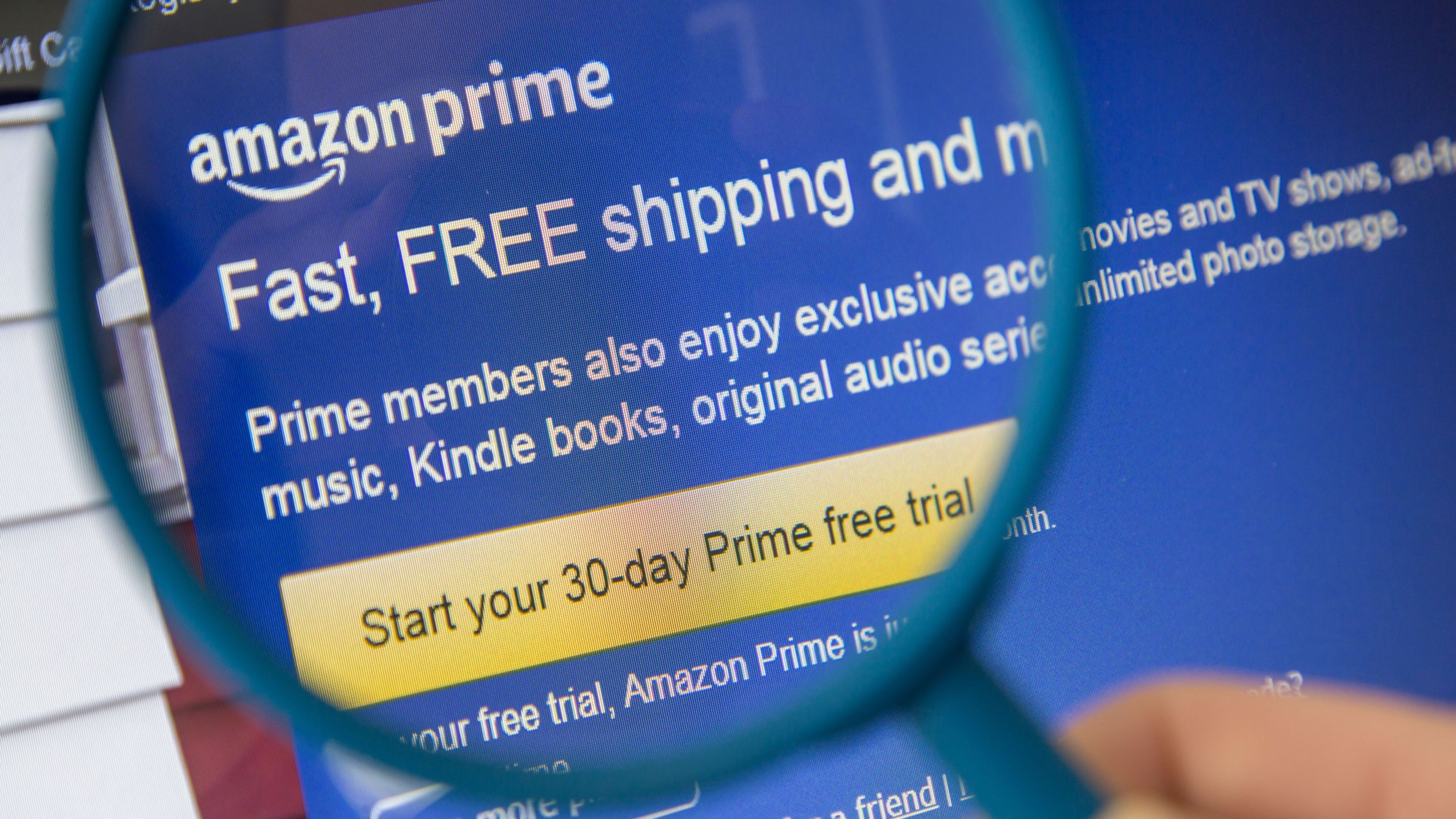 A magnifying glass approaching the Amazon Prime registration page