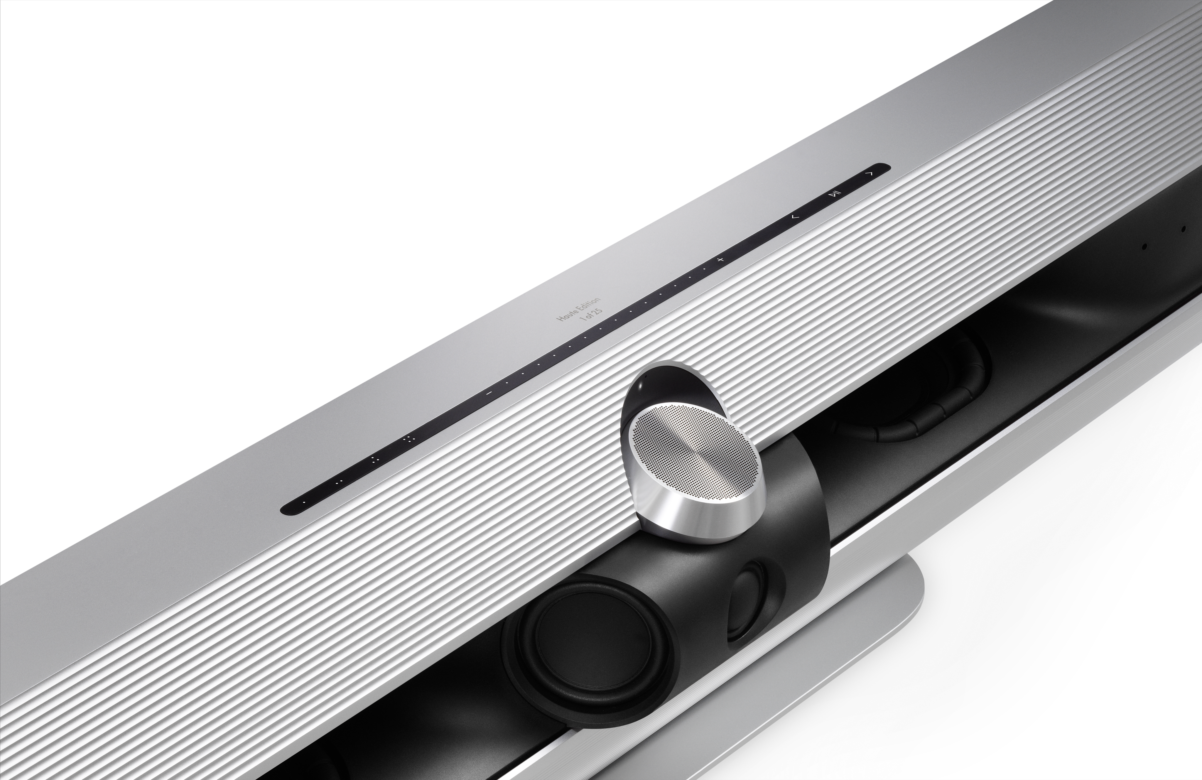 Closeup of the Bang & Olufsen Beosound Premiere showing its central controls. the image is on a white background