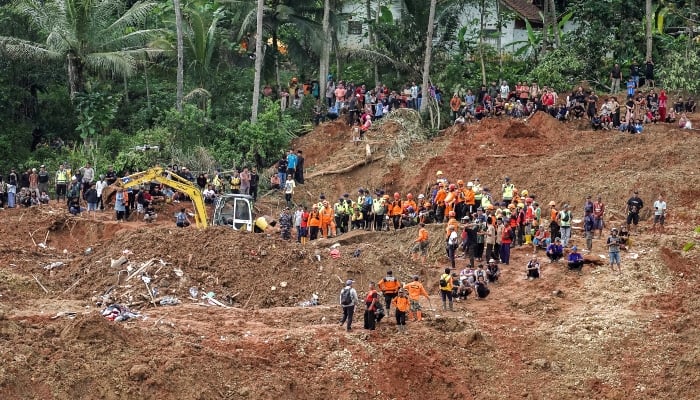 Indonesian rescue members search for victims at the site of a landslide that hit Cibeunying village on November 13, in Cilacap, Central Java province, Indonesia, November 15, 2025. – Reuters