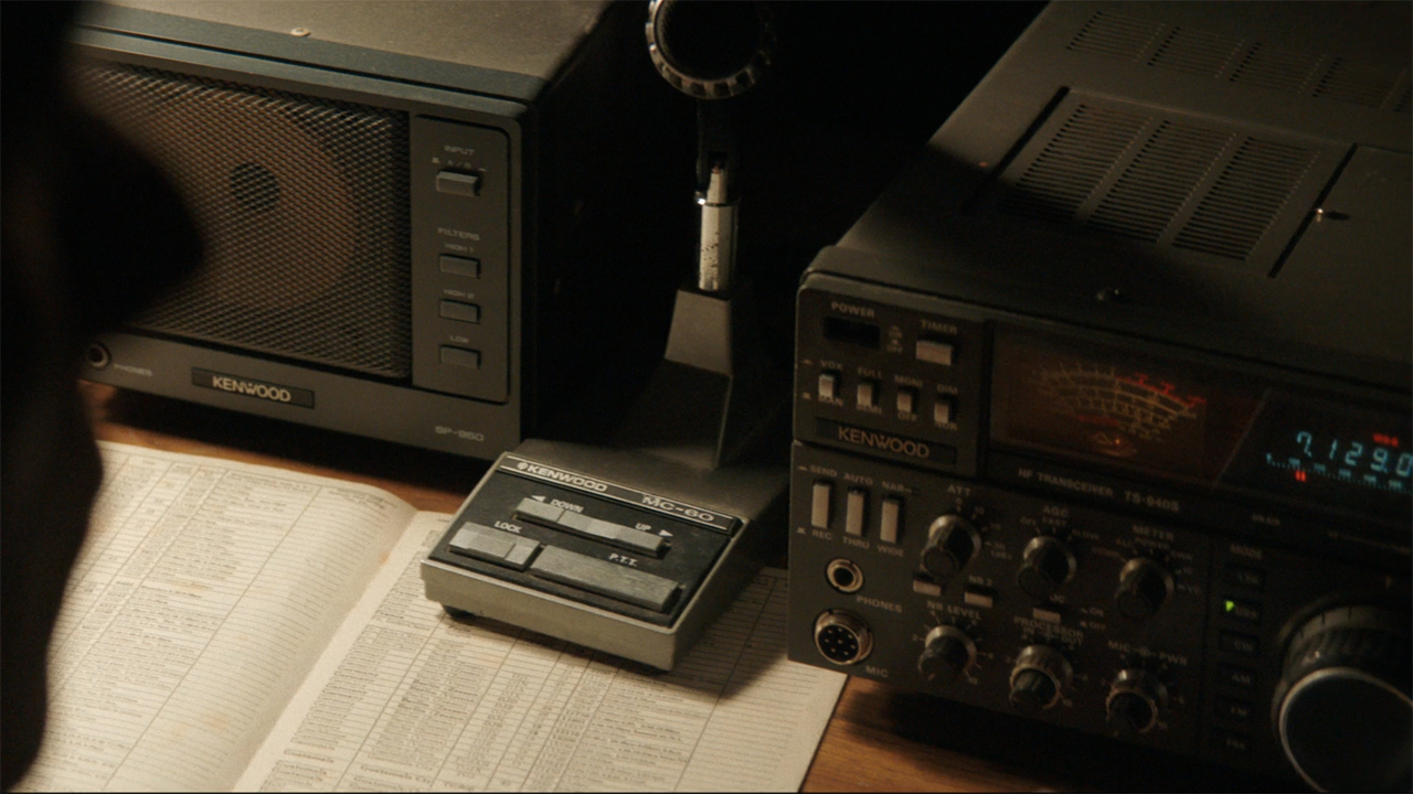 A screenshot of the radio equipment on a table in episode 4 of Pluribus.