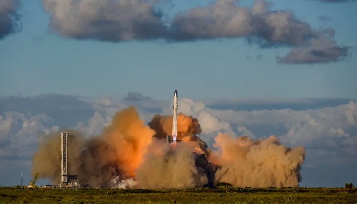 A SpaceX Super Heavy booster carrying the Starship spacecraft lifts off on its 11th integrated test flight at the company's launch pad in Starbase, Texas, in October. – Reuters