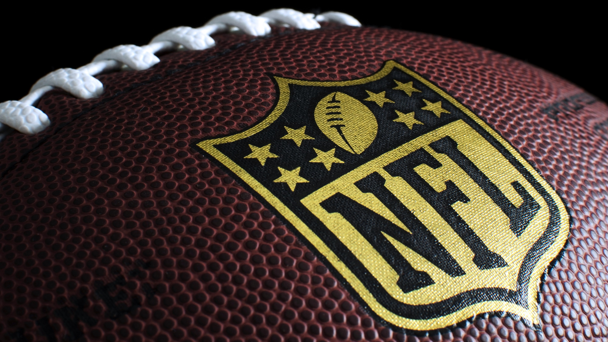 American football with the NFL logo.