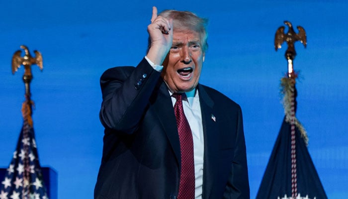 U.S. President Donald Trump gestures during the American Business Forum Miami at the Kaseya Center Arena in Miami, Florida, the United States, on November 5, 2025. – Reuters