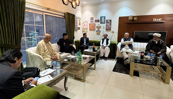 Tehreek Tahaffuz-e-Ayeen-Pakistan chief Mahmood Khan Achakzai (second from left) presides over a session of the opposition alliance in Rawalpindi on November 14, 2025. – Reporter