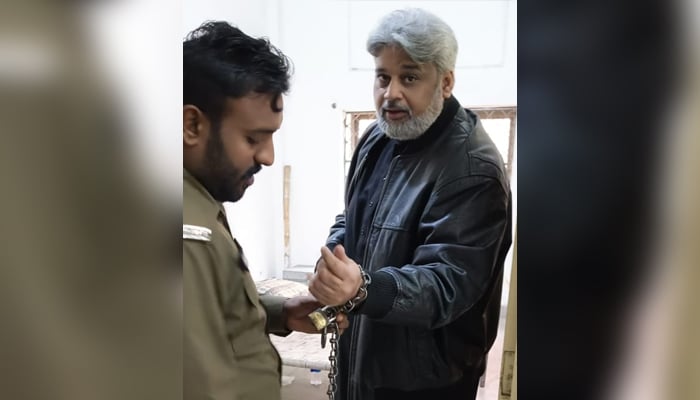 SIC Chairman Sahibzada Hamid Raza handcuffed by Punjab Police personnel. —X@_SahibzadaHamid