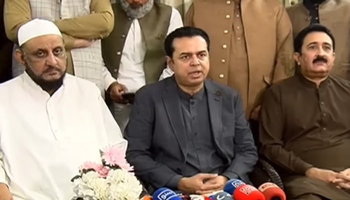 Minister of State for Home Affairs Talal Chaudhry (centre) addresses the press conference in Faisalabad on November 16, 2025. – Screenshot via PakGazette News