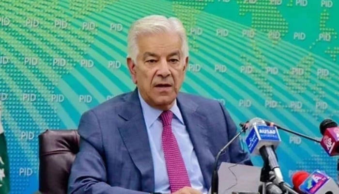 Defense Minister Khawaja Asif addresses a press conference in Islamabad. — PID/File