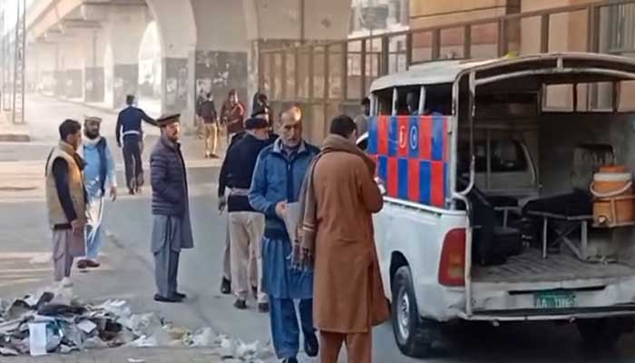 Police stand guard outside the Federal Police (FC) headquarters in Peshawar on November 24, 2025. – Screenshot via GeoNews