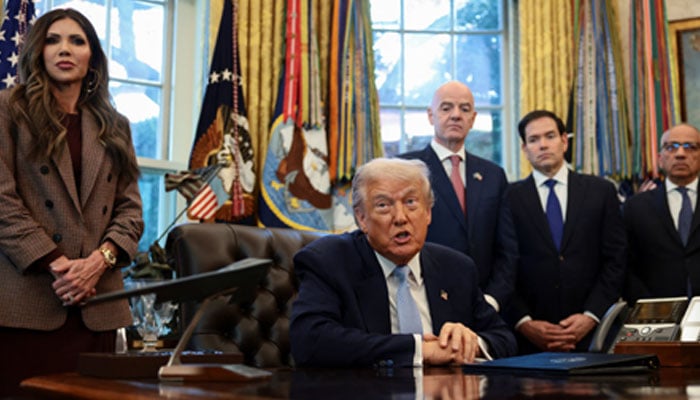 U.S. President Donald Trump speaks as U.S. Homeland Security Secretary Kristi Noem, FIFA President Gianni Infantino, U.S. Secretary of State Marco Rubio and FIFA President's Senior Advisor Carlos Cordeiro stand near him at the White House in Washington, DC, United States, November 17, 2025. – Reuters