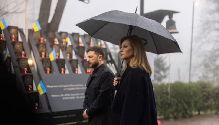 Ukrainian President Volodymyr Zelenskiy and his wife Olena attend a memorial ceremony in kyiv, Ukraine, November 21, 2025. – Reuters