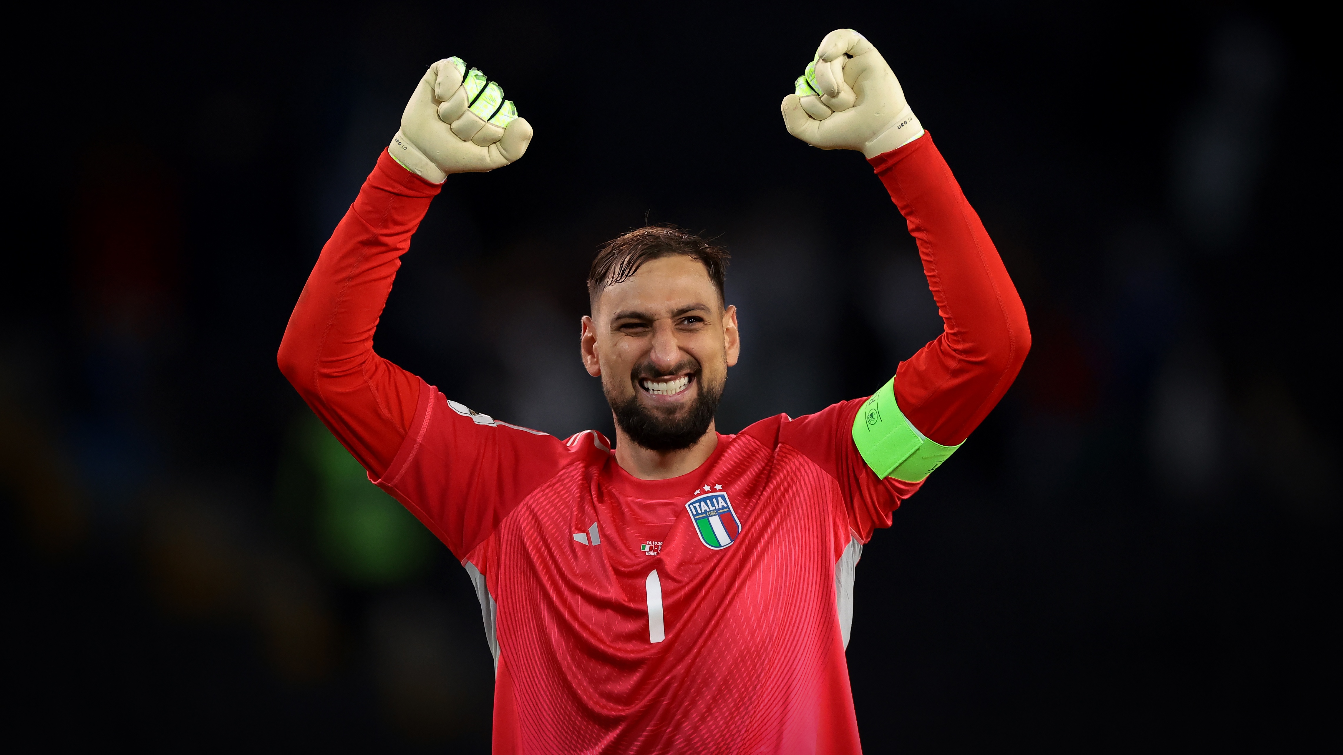 Gianluigi Donnarumma of Italy celebrates after a goal by teammate Gianluca Mancini during the 2026 FIFA World Cup Qualifying match between Italy and Israel at Stadio Friuli on October 14, 2025 in Udine, Italy.