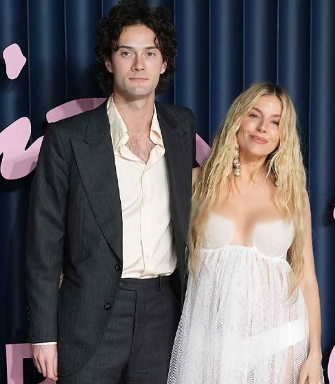 American Sniper star Sienna Miller debuts new baby bump in her third pregnancy