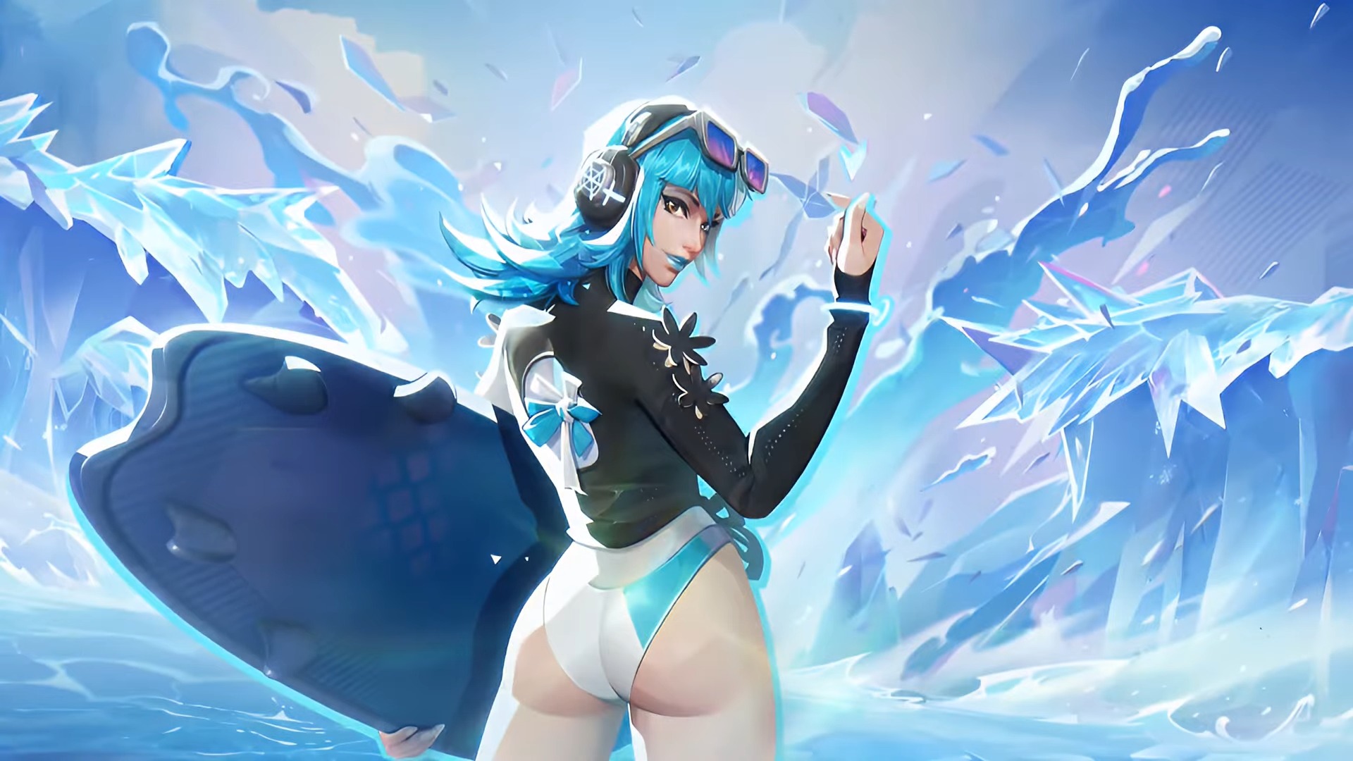 Luna Snow holds a surfboard and poses as waves crash in the background.