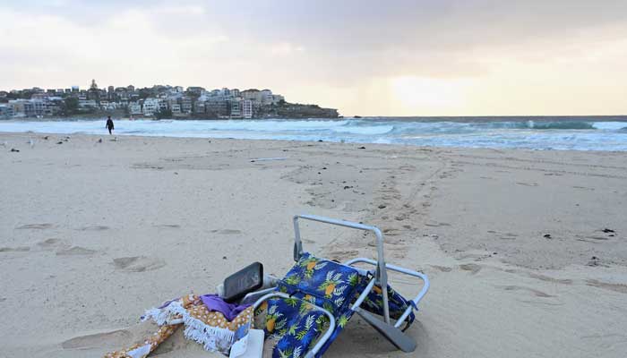 Items lie in the sand after the attack on a Jewish celebration on Sydney's Bondi Beach, in Sydney, Australia, on December 15, 2025. – Reuters