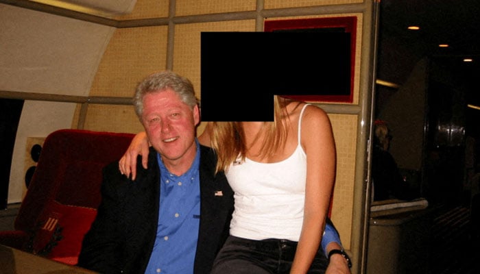 In this image from the estate of the late financier and convicted sex offender Jeffrey Epstein, released by the Department of Justice in Washington, DC, U.S., on December 19, 2025, former U.S. President Bill Clinton and a woman are seen. – Reuters
