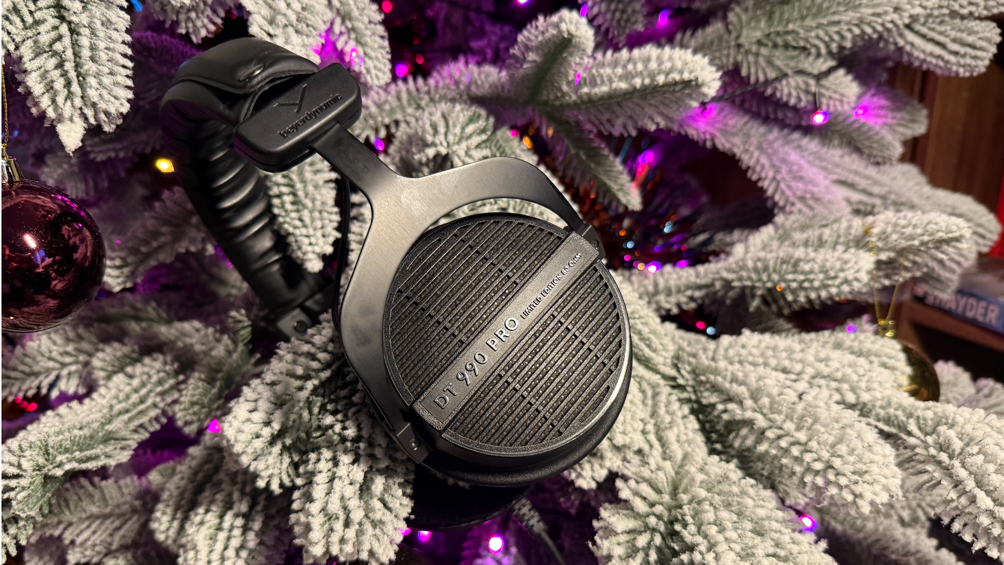 The Beyerdynamic DT 990 Pro hanging from a Christmas tree