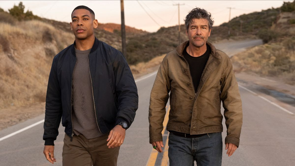 John Stewart and Hal Jordan walking down a street in DC Studios' Lanterns TV show