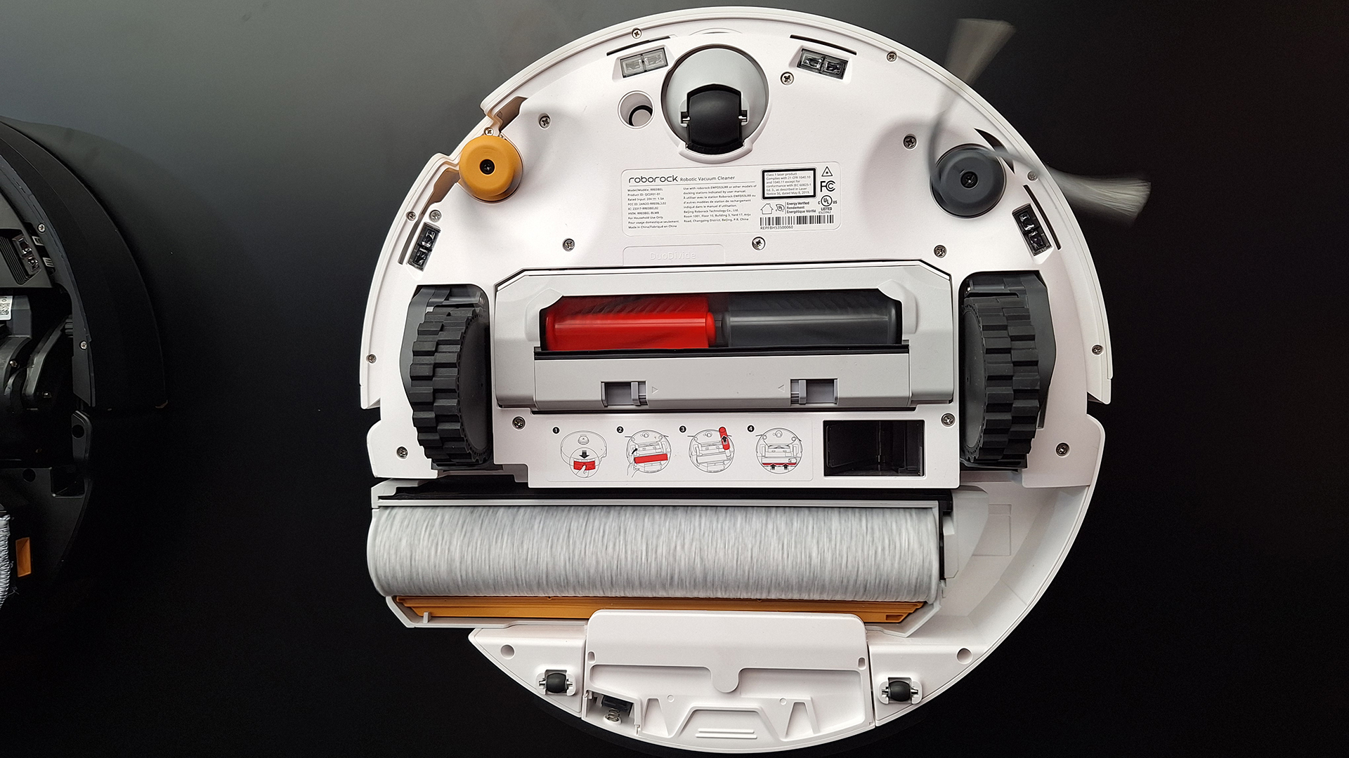 Roborock Qrevo Curv 2 robot vacuum cleaner flipped over to reveal mopping system underneath