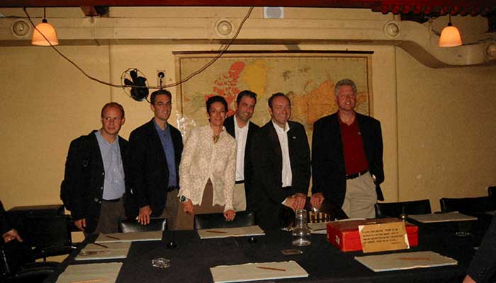 Former U.S. President Bill Clinton and Ghislaine Maxwell appear in this image from the estate of late financier and convicted sex offender Jeffrey Epstein, released by the Department of Justice in Washington, DC, U.S., December 19, 2025. – Reuters