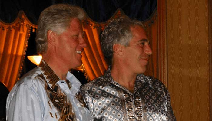 Former US President Bill Clinton stands with Jeffrey Epstein in this image released by the Department of Justice in Washington, DC, US, on December 19, 2025, as part of a new trove of documents from its investigations into the late financier and convicted sex offender Jeffrey Epstein. – Reuters