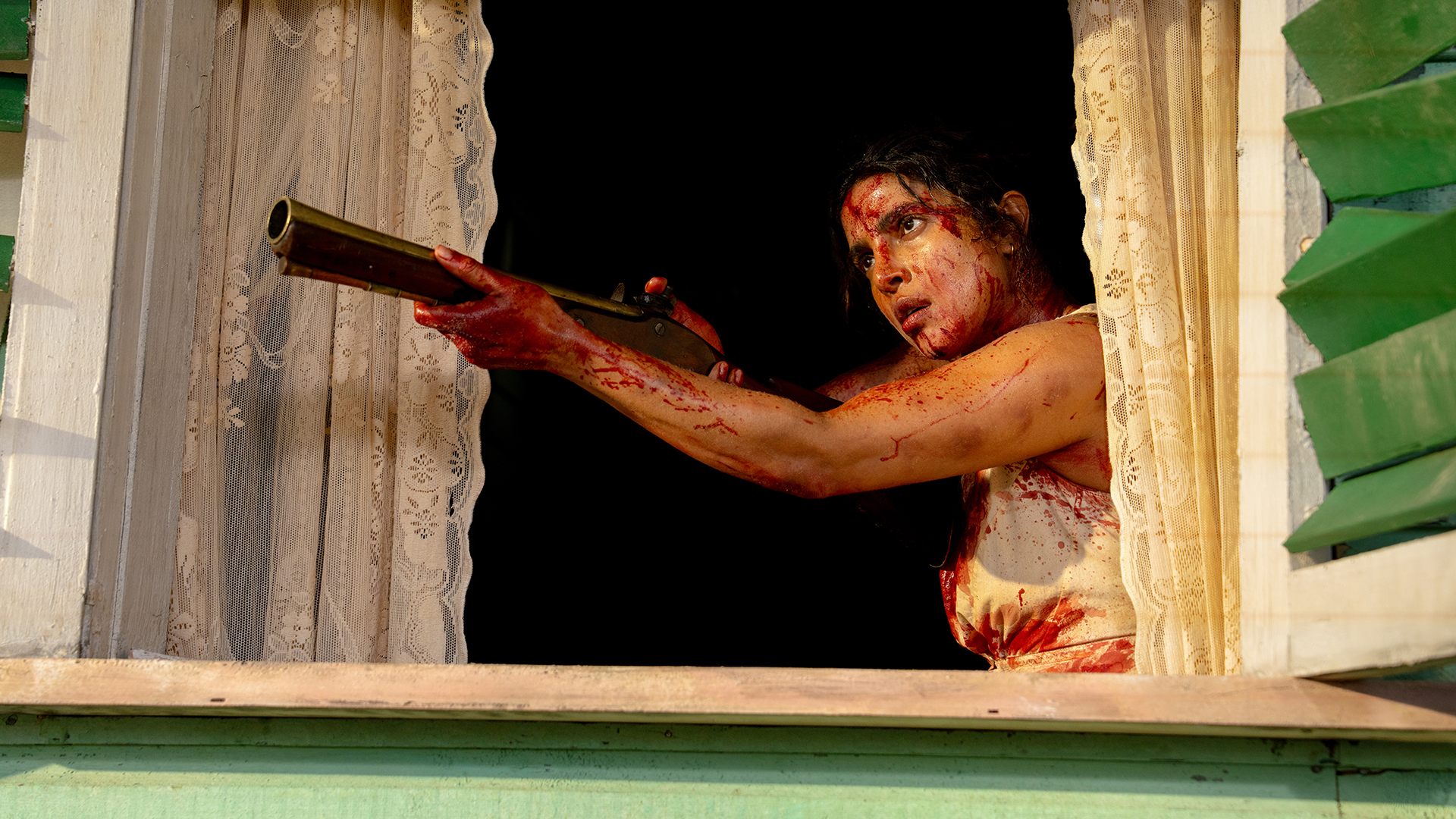 Bloody Mary aiming a blunderbuss and looking out a window on The Bluff