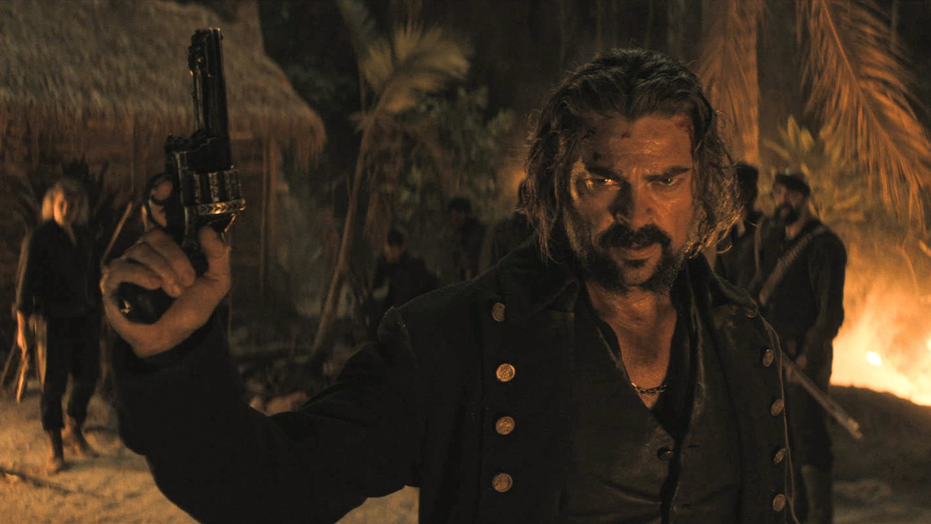 Connor holding his gun up at night on The Bluff