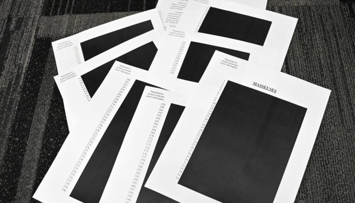 Documents redacted after the US Department of Justice began releasing long-awaited records from the investigation into the politically explosive case of convicted sex offender Jeffrey Epstein. — AFP