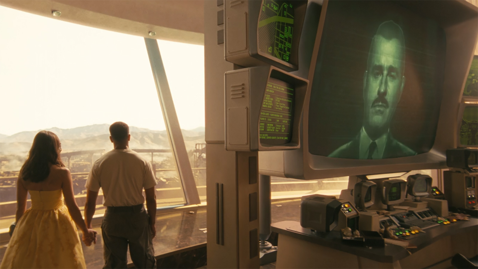 Lucy and Maximus holding hands and looking out a window as Robert House appears on a computer screen in Fallout Season 2, Episode 8.