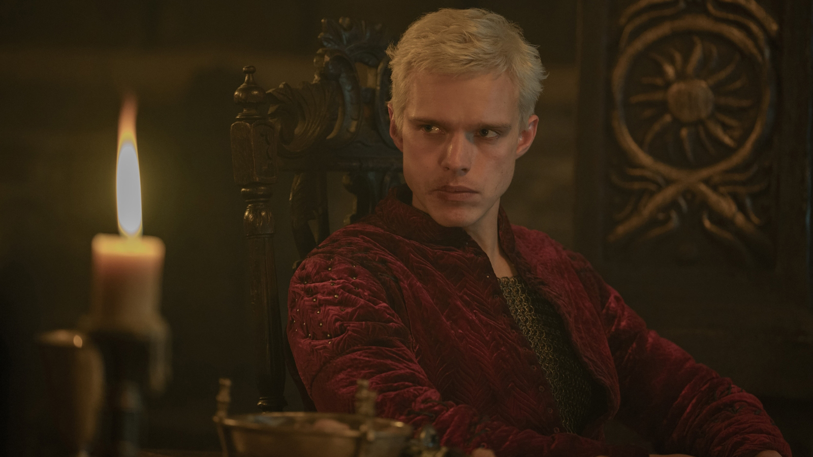Aerion Targaryen sitting next to a lit candle in episode 4 of The Knight of the Seven Kingdoms
