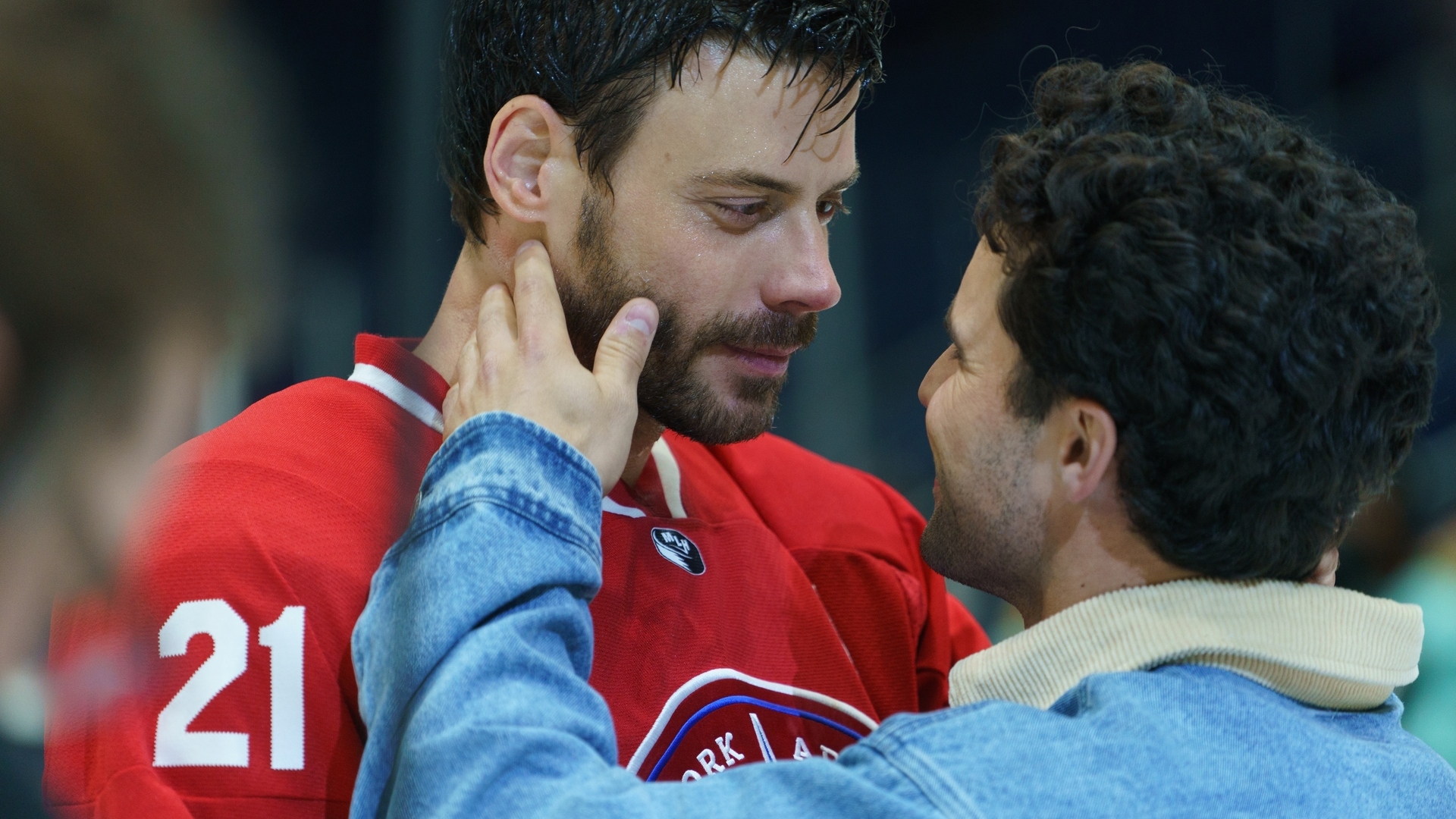 Kip and Scott look at each other intensely in Heat Rivalry