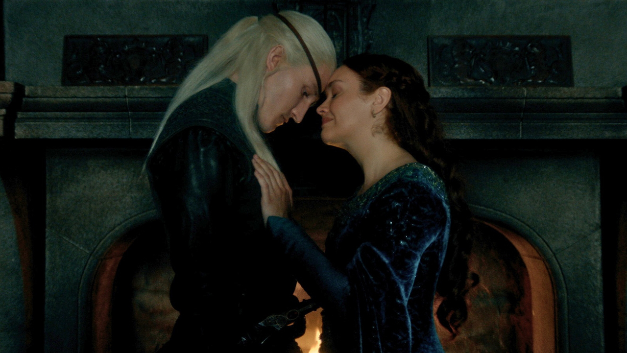 Aemond and Alicent hold hands and place their foreheads against each other in House of the Dragon season 3.