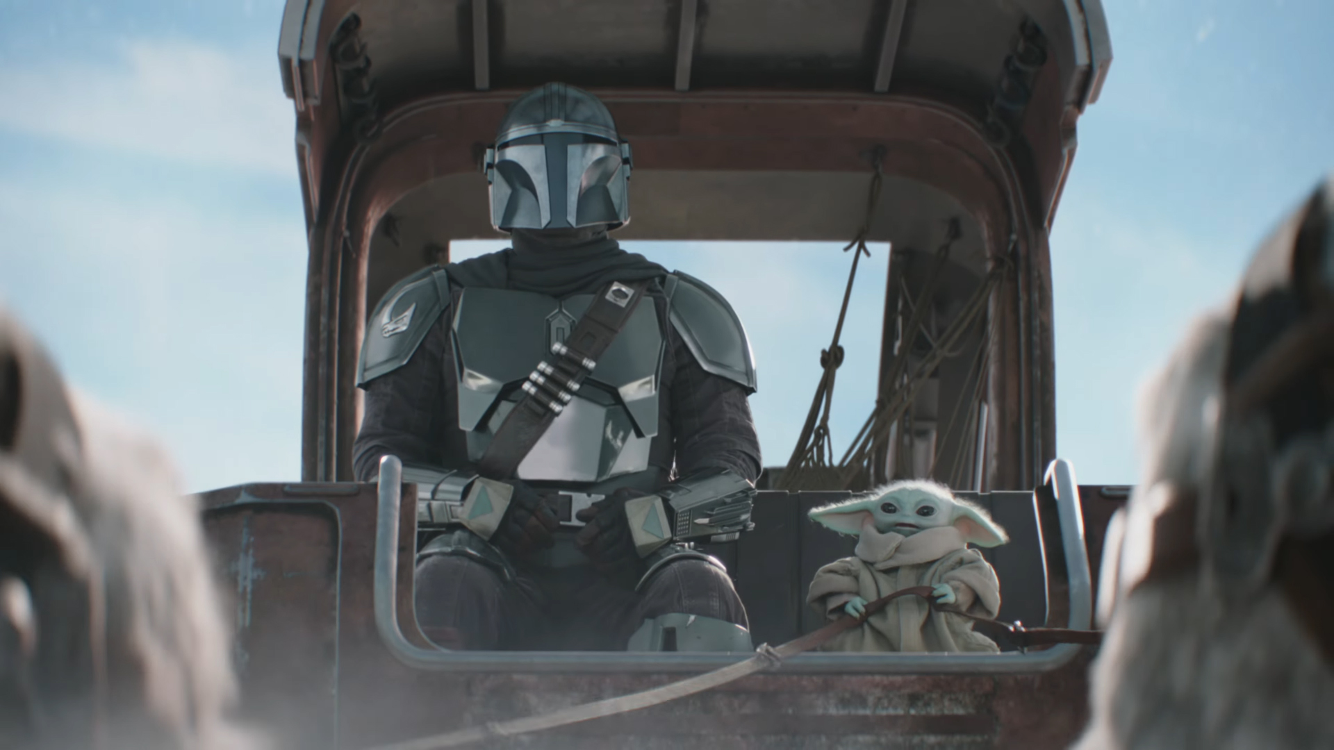 Din Djarin and Baby Yoda sitting on a sleigh pulled by Tauntauns in The Mandalorian and Grogu's Super Bowl 2026 TV spot