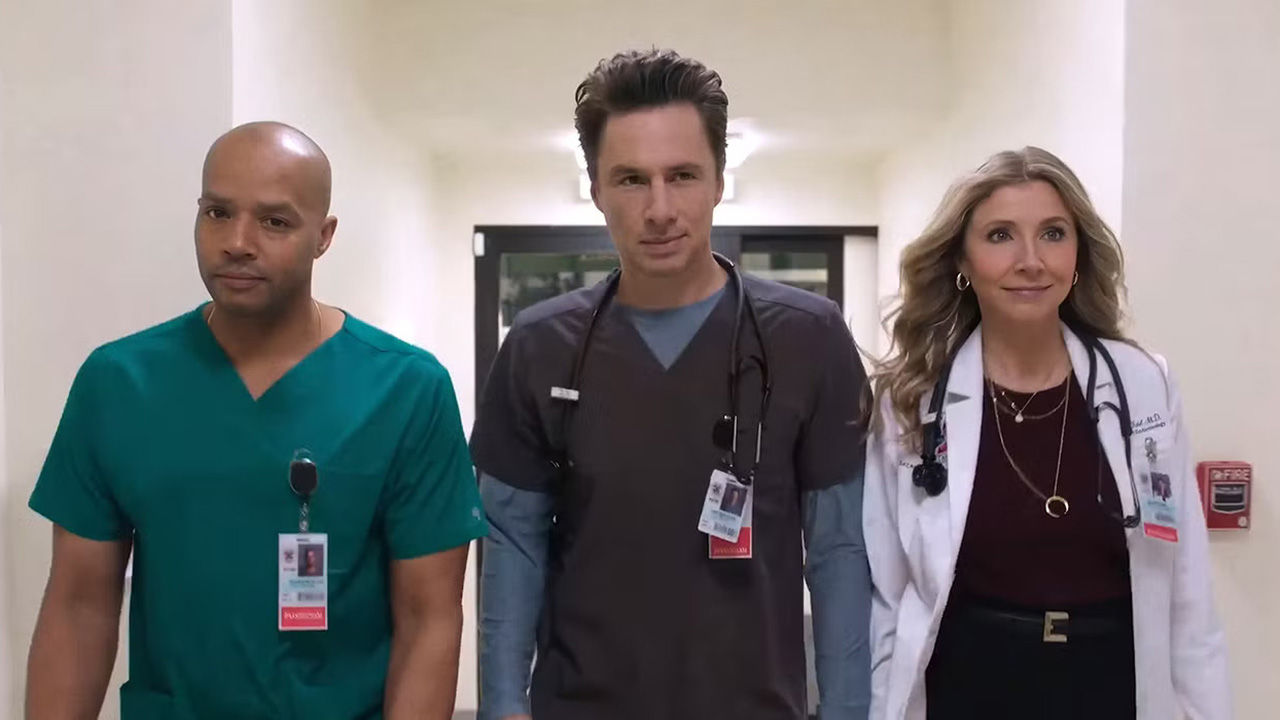 Turk, JD and Elliot walking down a hospital hallway in season 10 of Scrubs
