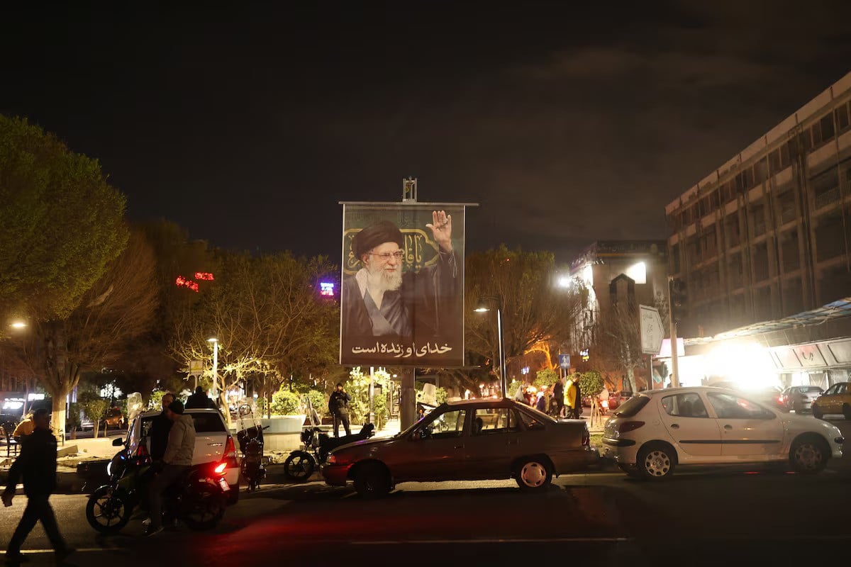 A banner of Iran's Supreme Leader Ayatollah Ali Khamenei on a street, after his death in Israeli and US strikes on Saturday, in Tehran, Iran, March 1, 2026. – Reuters