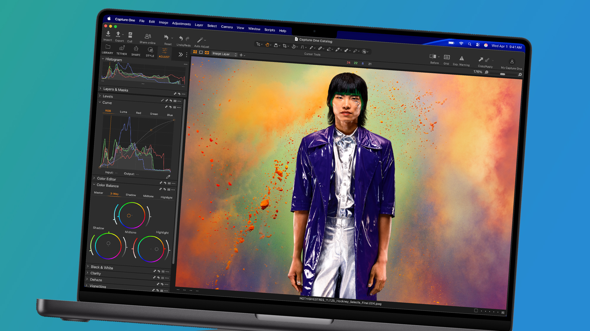 The Apple MacBook Pro M5 Pro on a green and blue background