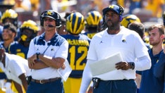 Former Michigan coach Jim Harbaugh reacts to Sherrone Moore firing and charges