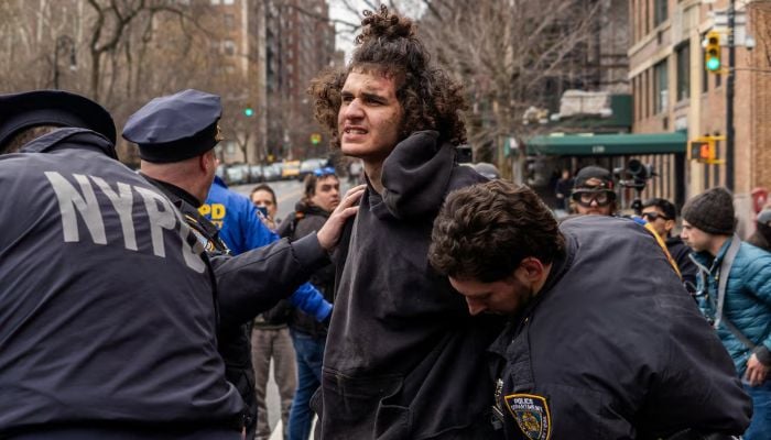 Counter-protester Emir Balat is detained by New York Police Department (NYPD) officers outside Gracie Mansion, the official residence of New York Mayor Zohran Mamdani, during an anti-Islam protest led by far-right activist Jake Lang in New York City, New York, United States, March 7, 2026. – Reuters