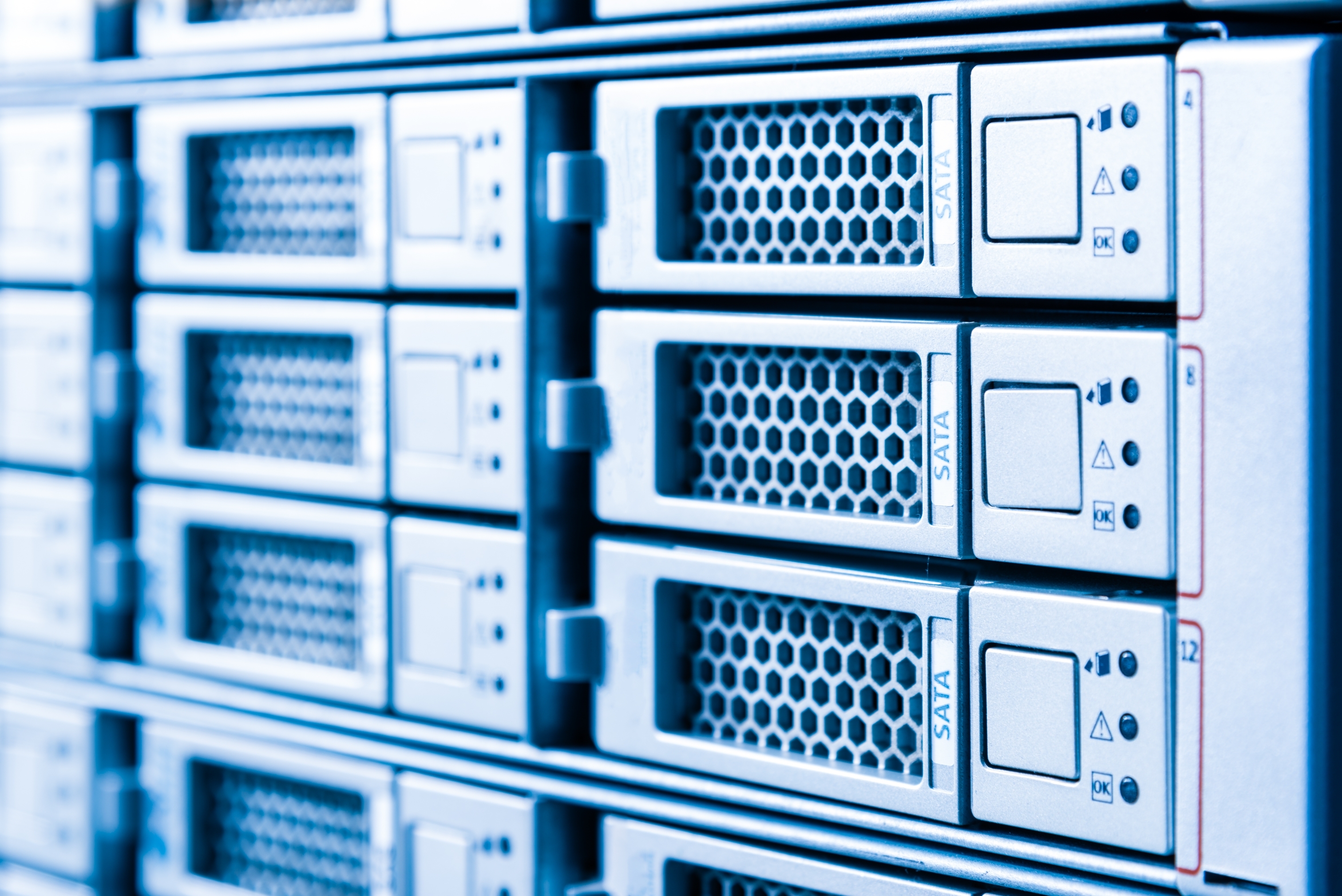 Row of hard drives serving as data storage inside the server room